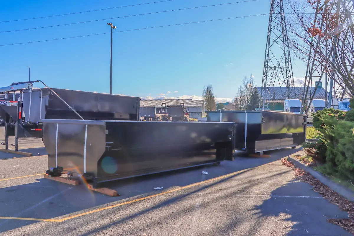 Roll-off dumpster ready for waste disposal at job site for Construction Dumpster Rental in College Park